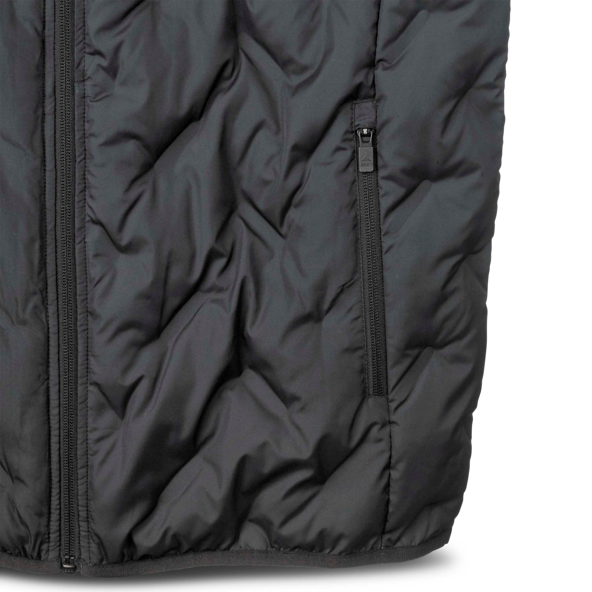 Nærbilde av sort Padded vest Oxford fritidsplagg med quiltet tekstur og glidelåslomme