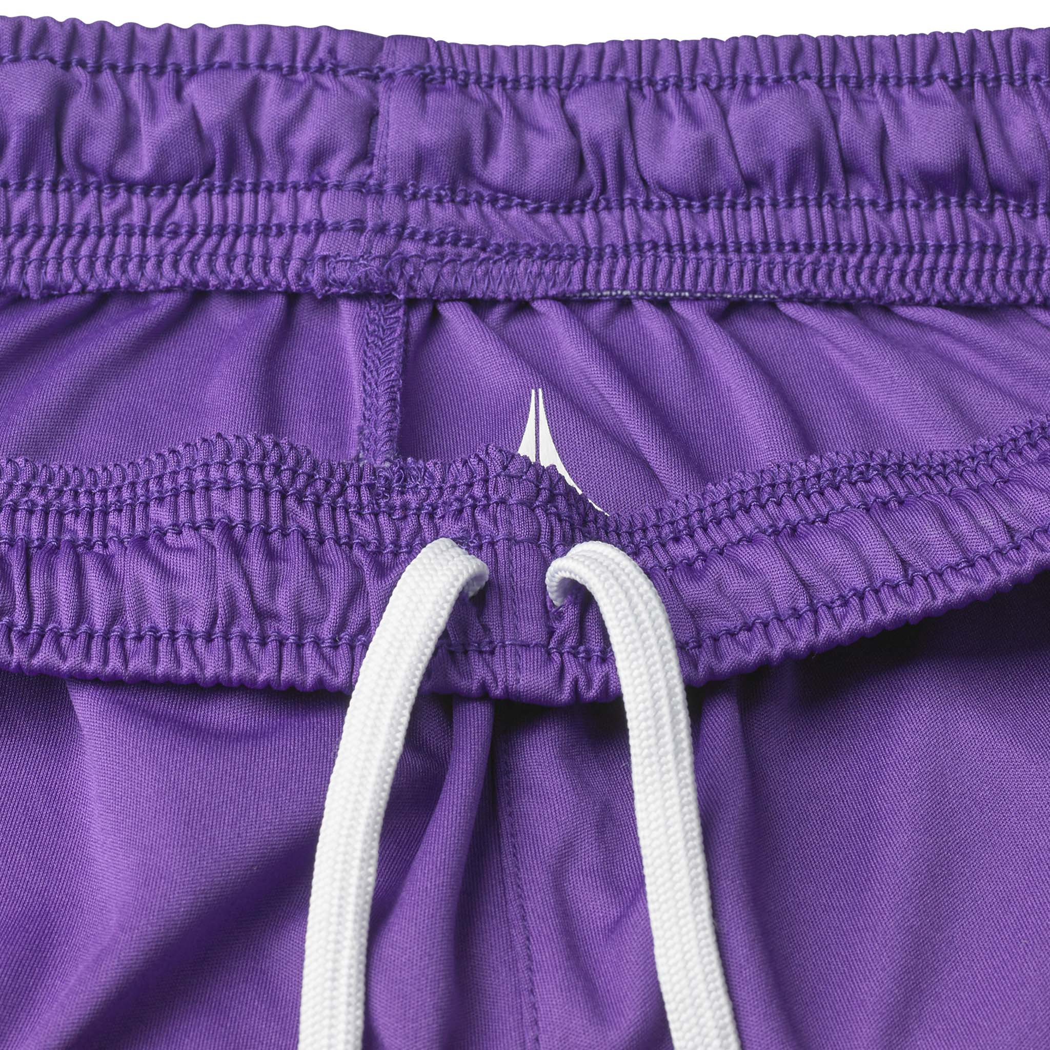Nærbilde av lilla Player shorts Spain v25, Match & Training wear, med elastisk linning og hvit snor.