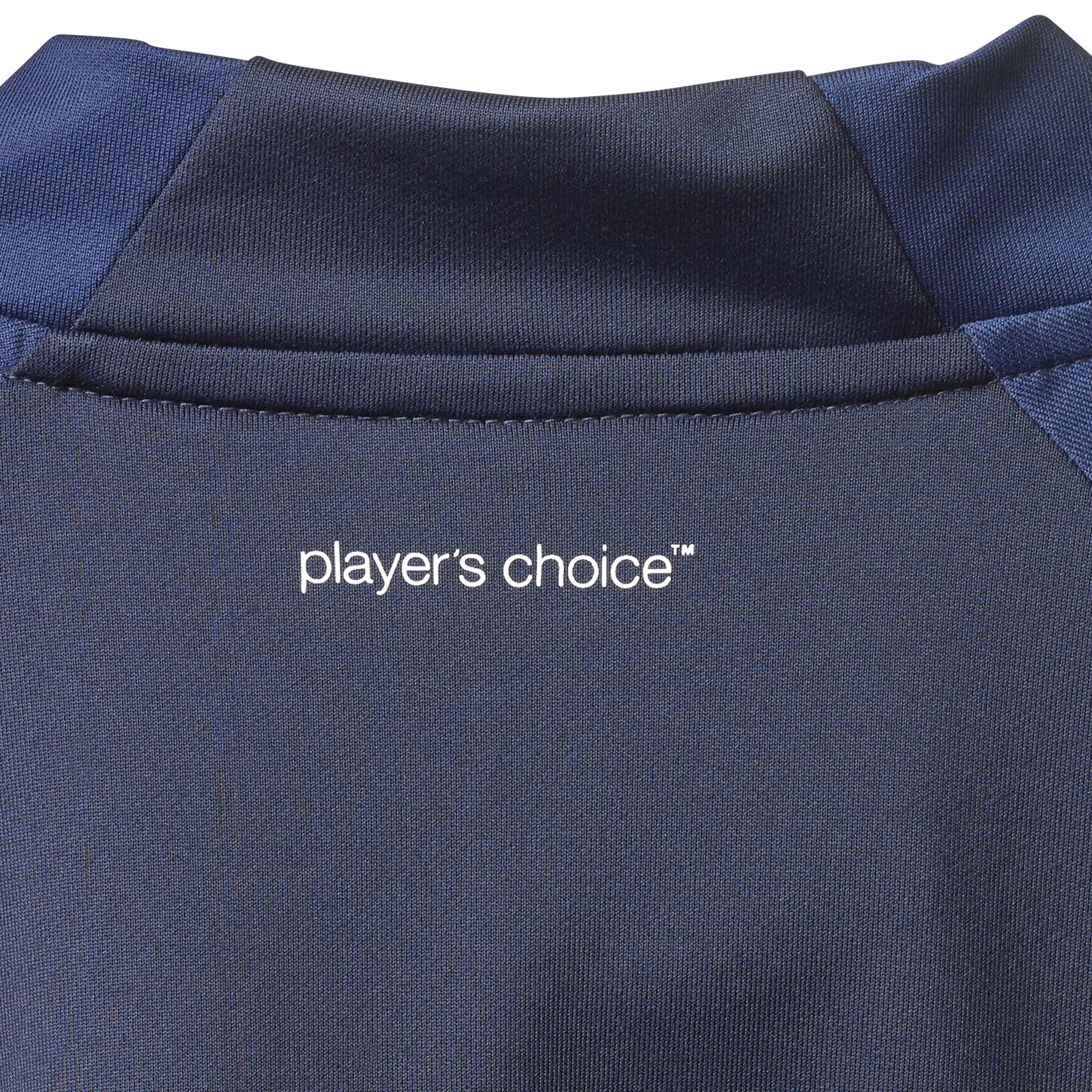 Nærbilde av marineblå Training zip jacket Spain v25, Match & Training wear, med hvitt 'player's choice'-trykk.