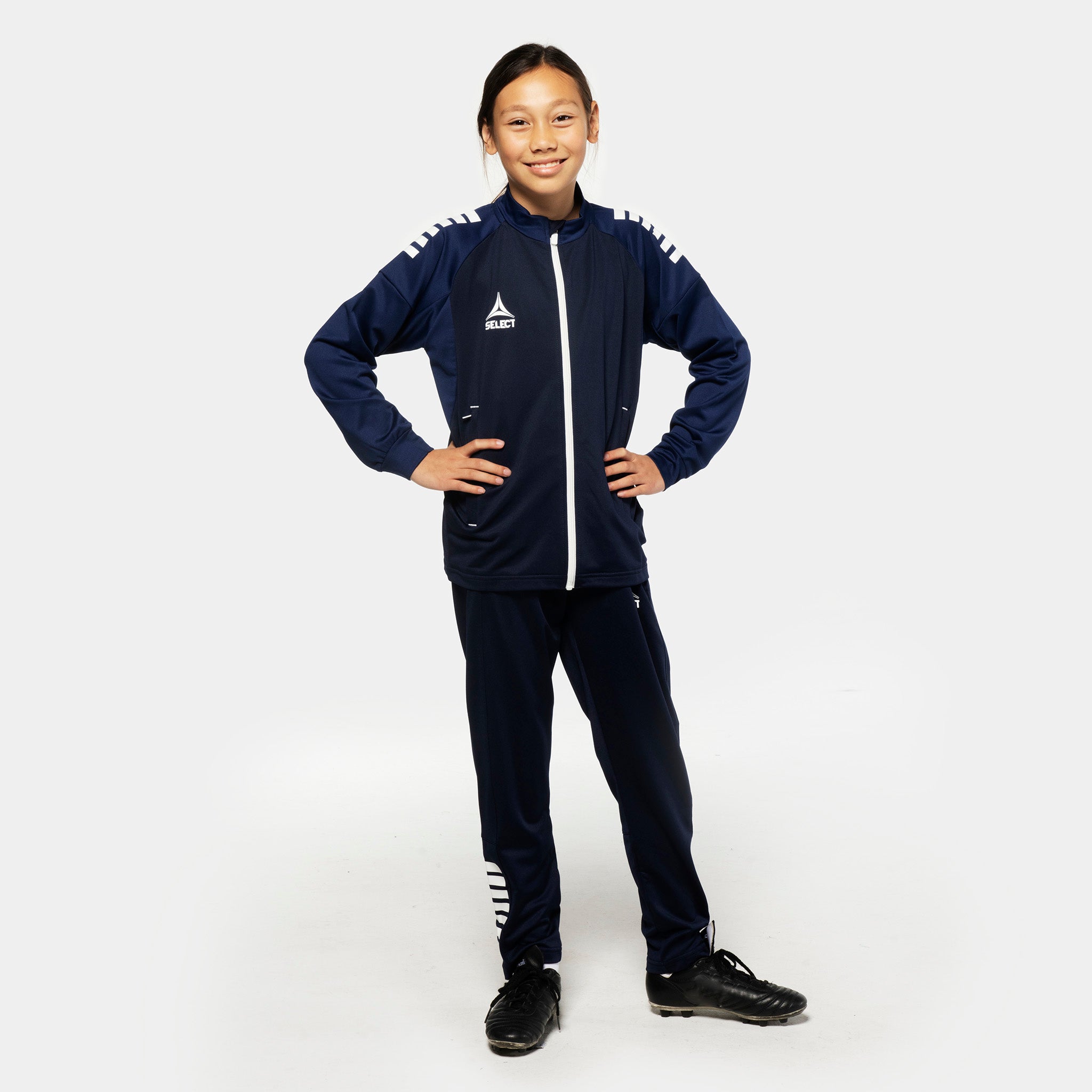 Jente fotballspiller i marineblå Training zip jacket & pants regularFit Spain v25, Match & Training wear, forfra