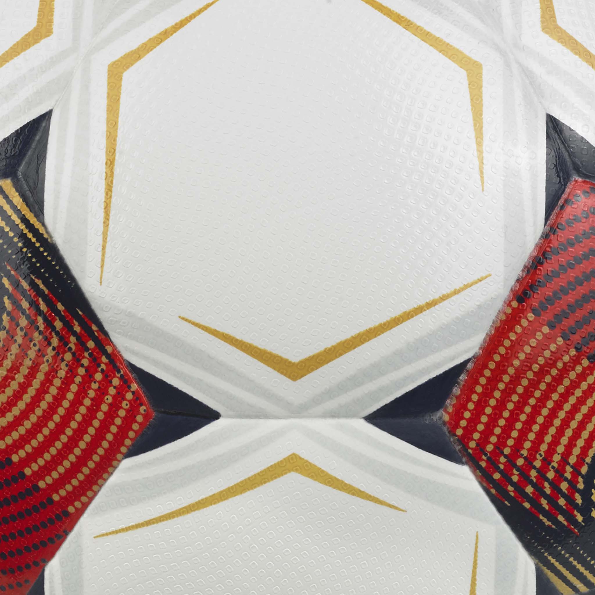 Nærbilde av Talento Light v26 fotball med hvite, røde, gylne og marineblå paneler og strukturert overflate.