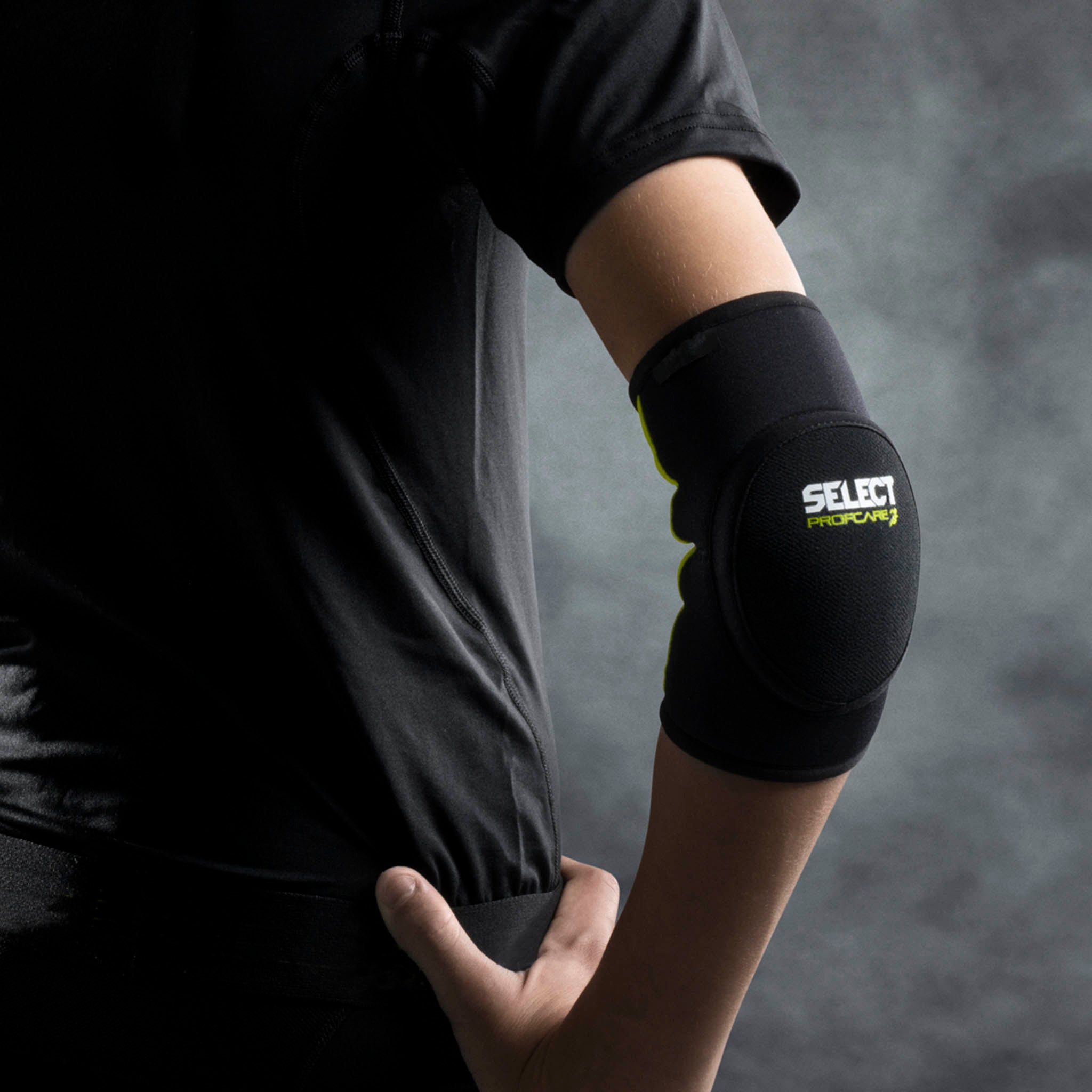 Albuebandasje med kompression- barn #farge_svart