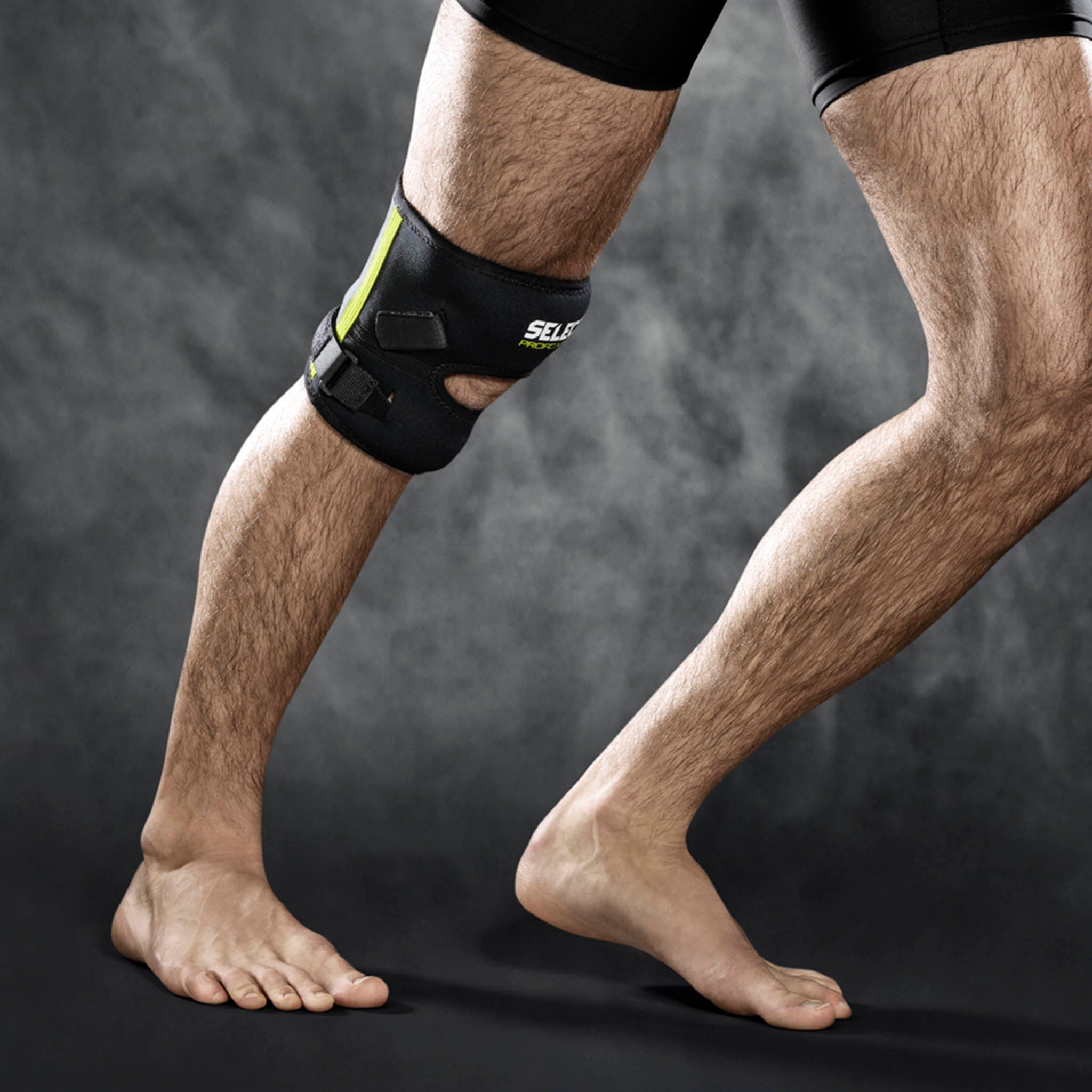 Knebandasje med stabilizer #farge_svart